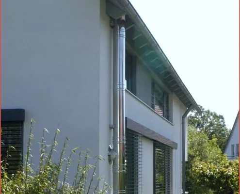 Kaminbau, Kaminsanierung & Ofenbau Loderer Mehrfamilienhaus mit Außenkamin
